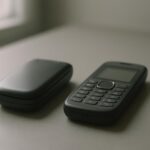 Two basic keypad phones side by side, illustrating Nokia models and WhatsApp compatibility